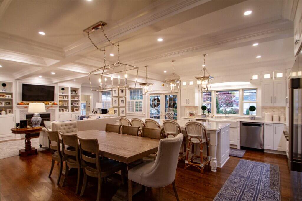 open concept kitchen with white cabinets