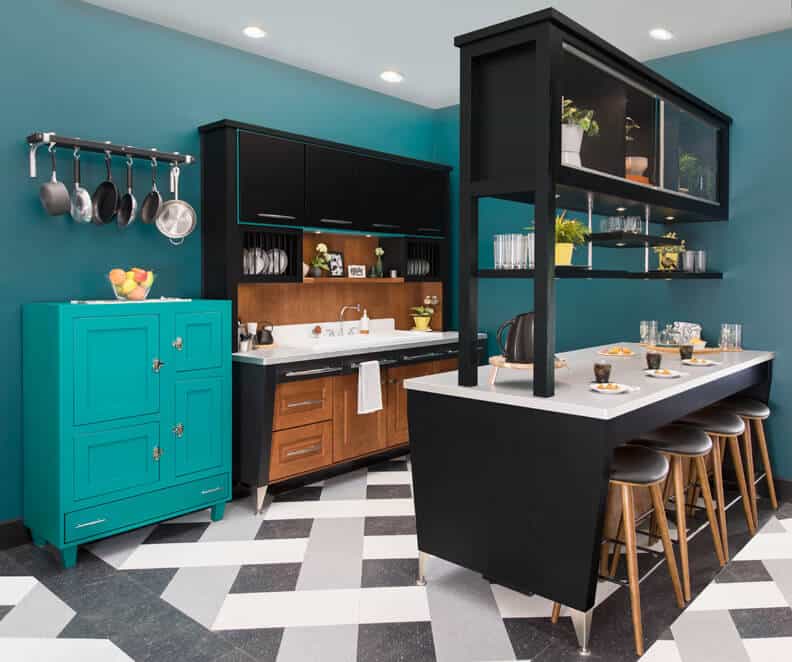 black kitchen cabinets with a blue color pop hutch