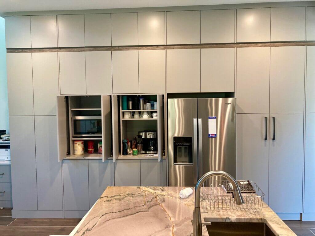 kitchen with tall cabinet storage
