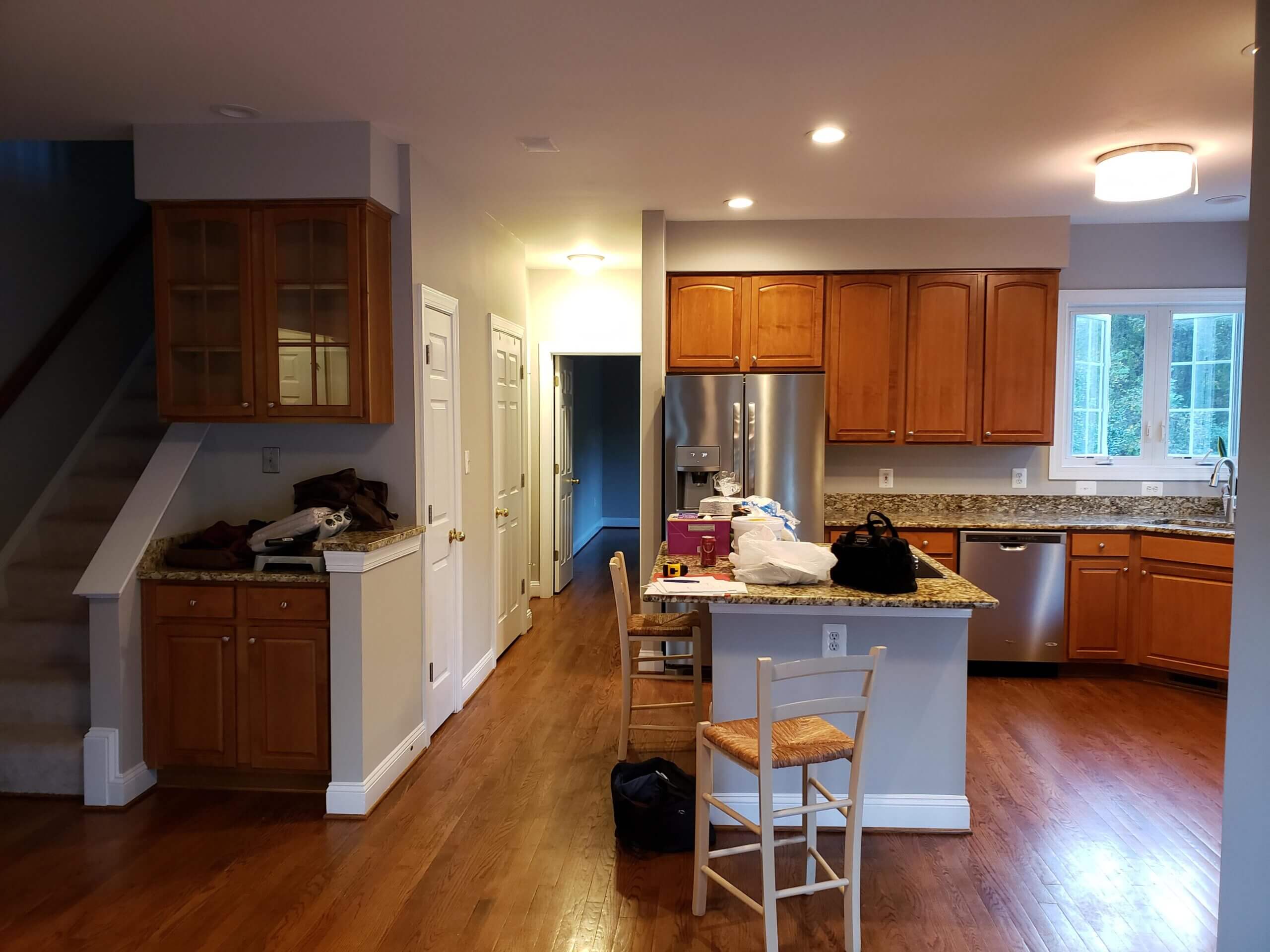 large kitchen with wood cabinets and island