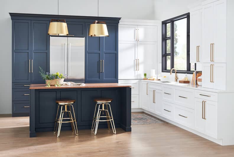 dark blue kitchen cabinets with white accent