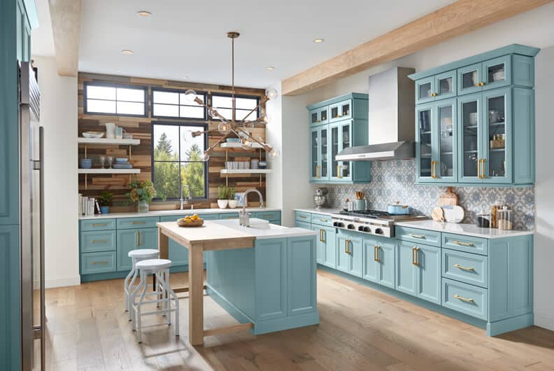 Light blue kitchen cabinets with island