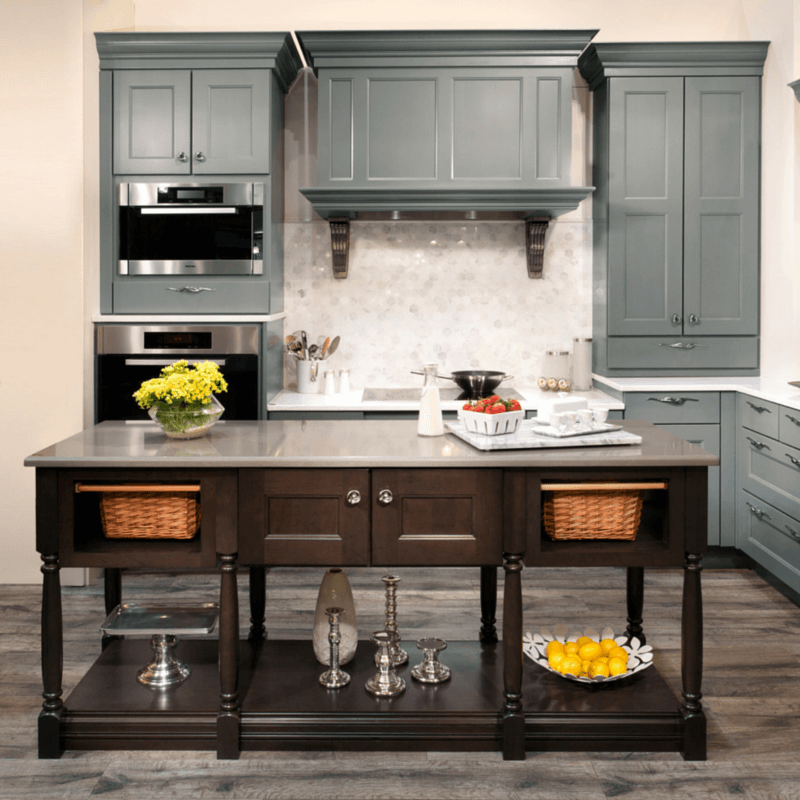 This island, characterized by its unique storage solutions, stands out among the other cabinetry.