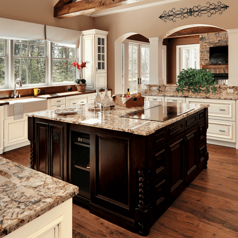 This island is PERFECT for this large kitchen! A cooktop, storage, and beauty all incorporated in one piece!